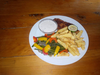 Fish and chips with veggies and Tartar sauce