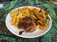 Grilled chicken fried vegetables and chips